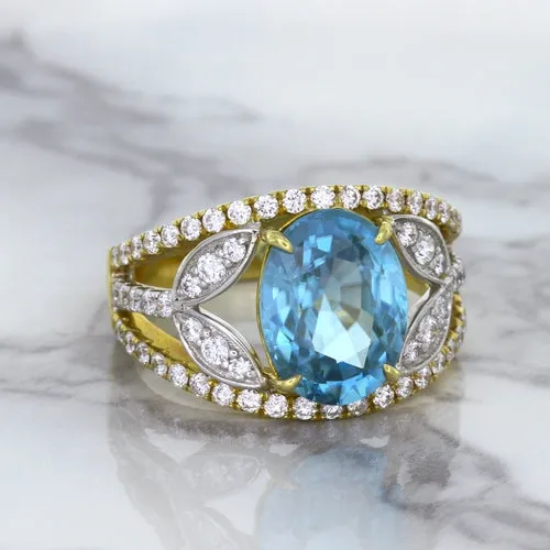 5.29ct Oval Blue Zircon Ring with Diamond Accents in 18K Yellow Gold