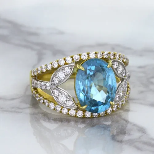 5.29ct Oval Blue Zircon Ring with Diamond Accents in 18K Yellow Gold