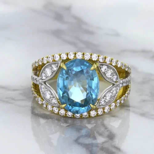 5.29ct Oval Blue Zircon Ring with Diamond Accents in 18K Yellow Gold