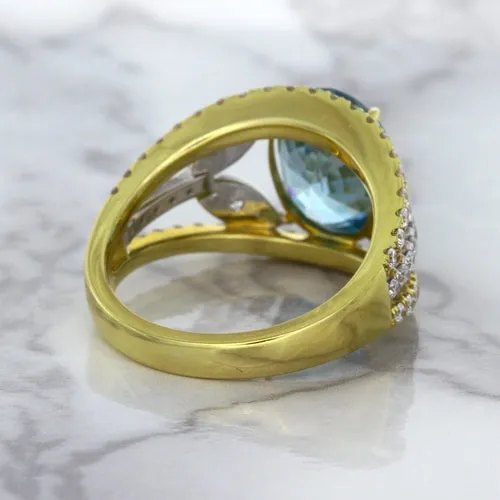 5.29ct Oval Blue Zircon Ring with Diamond Accents in 18K Yellow Gold