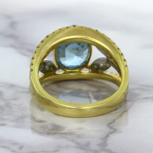 5.29ct Oval Blue Zircon Ring with Diamond Accents in 18K Yellow Gold