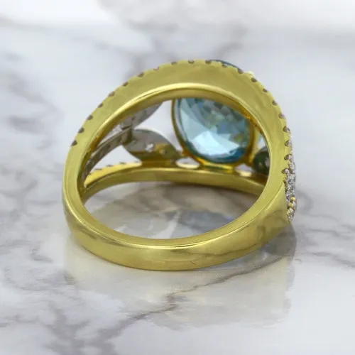 5.29ct Oval Blue Zircon Ring with Diamond Accents in 18K Yellow Gold