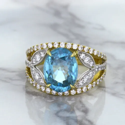 5.29ct Oval Blue Zircon Ring with Diamond Accents in 18K Yellow Gold