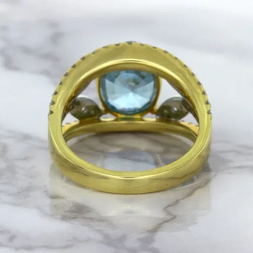 5.29ct Oval Blue Zircon Ring with Diamond Accents in 18K Yellow Gold
