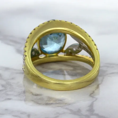 5.29ct Oval Blue Zircon Ring with Diamond Accents in 18K Yellow Gold