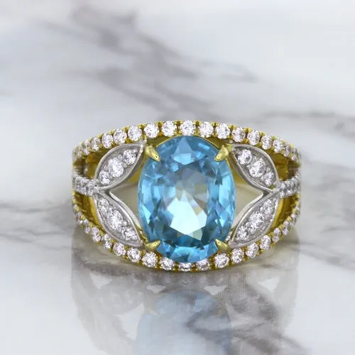 5.29ct Oval Blue Zircon Ring with Diamond Accents in 18K Yellow Gold