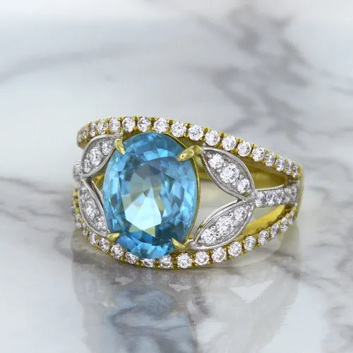 5.29ct Oval Blue Zircon Ring with Diamond Accents in 18K Yellow Gold