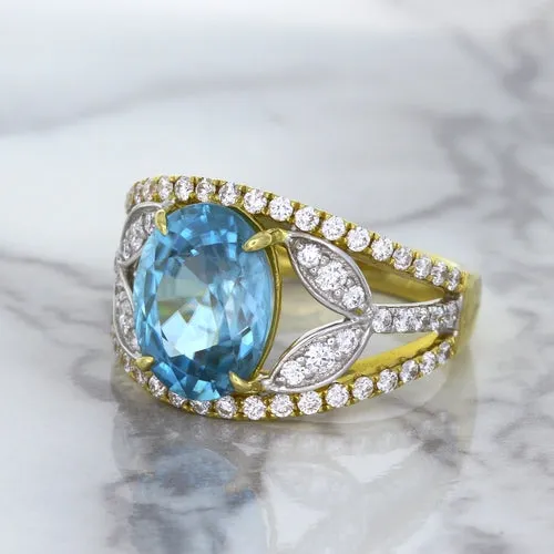 5.29ct Oval Blue Zircon Ring with Diamond Accents in 18K Yellow Gold