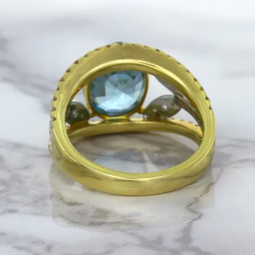 5.29ct Oval Blue Zircon Ring with Diamond Accents in 18K Yellow Gold