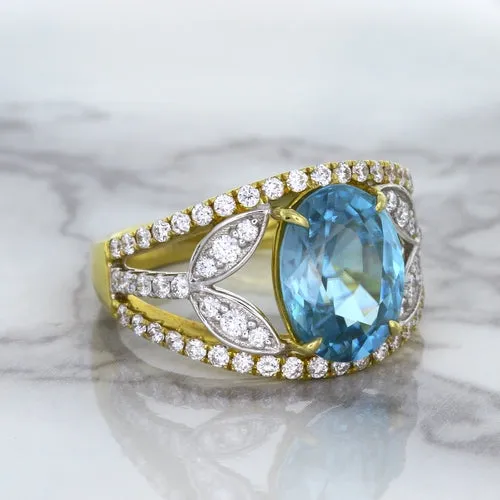 5.29ct Oval Blue Zircon Ring with Diamond Accents in 18K Yellow Gold