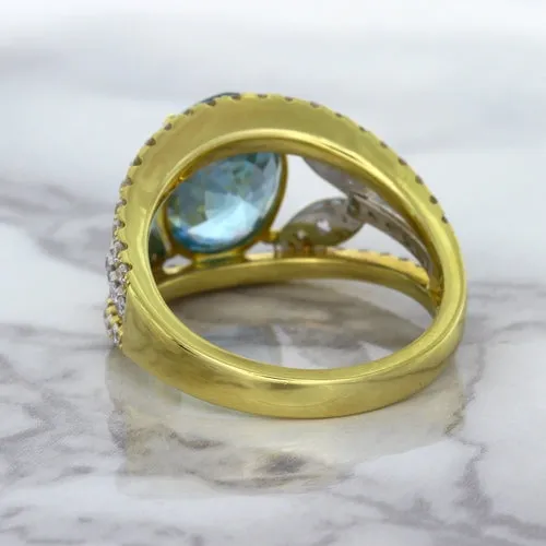 5.29ct Oval Blue Zircon Ring with Diamond Accents in 18K Yellow Gold