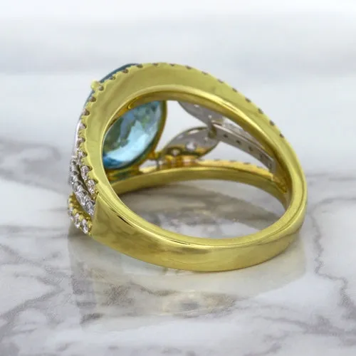 5.29ct Oval Blue Zircon Ring with Diamond Accents in 18K Yellow Gold