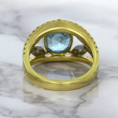 5.29ct Oval Blue Zircon Ring with Diamond Accents in 18K Yellow Gold