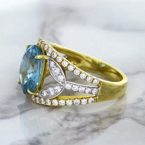 5.29ct Oval Blue Zircon Ring with Diamond Accents in 18K Yellow Gold