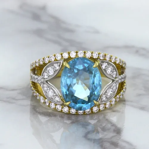 5.29ct Oval Blue Zircon Ring with Diamond Accents in 18K Yellow Gold