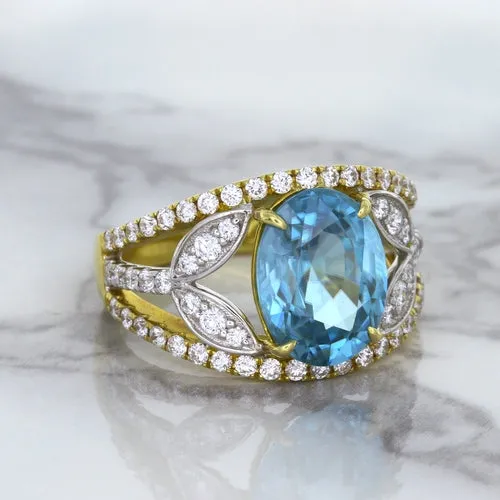 5.29ct Oval Blue Zircon Ring with Diamond Accents in 18K Yellow Gold