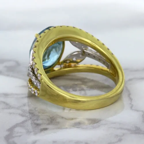 5.29ct Oval Blue Zircon Ring with Diamond Accents in 18K Yellow Gold