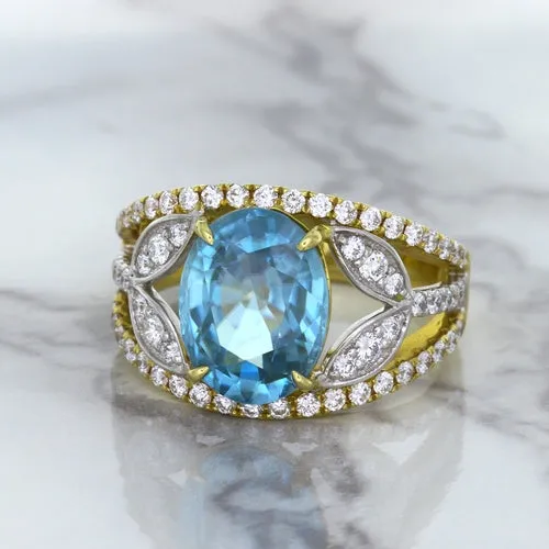 5.29ct Oval Blue Zircon Ring with Diamond Accents in 18K Yellow Gold