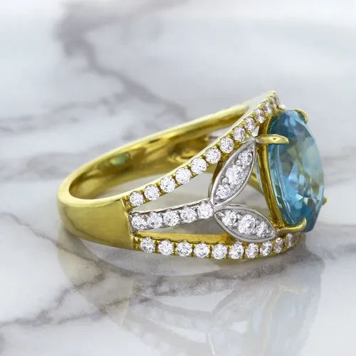5.29ct Oval Blue Zircon Ring with Diamond Accents in 18K Yellow Gold
