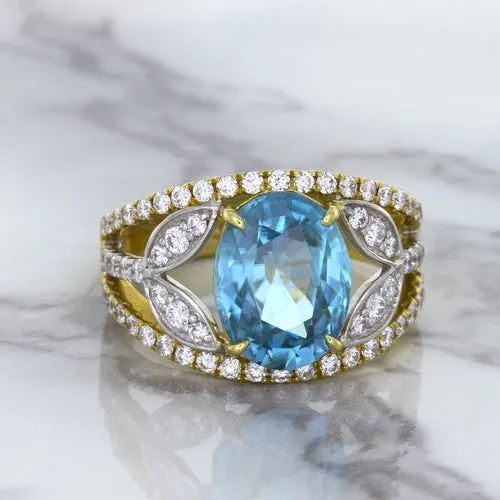 5.29ct Oval Blue Zircon Ring with Diamond Accents in 18K Yellow Gold