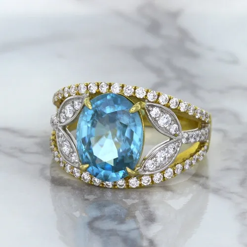 5.29ct Oval Blue Zircon Ring with Diamond Accents in 18K Yellow Gold