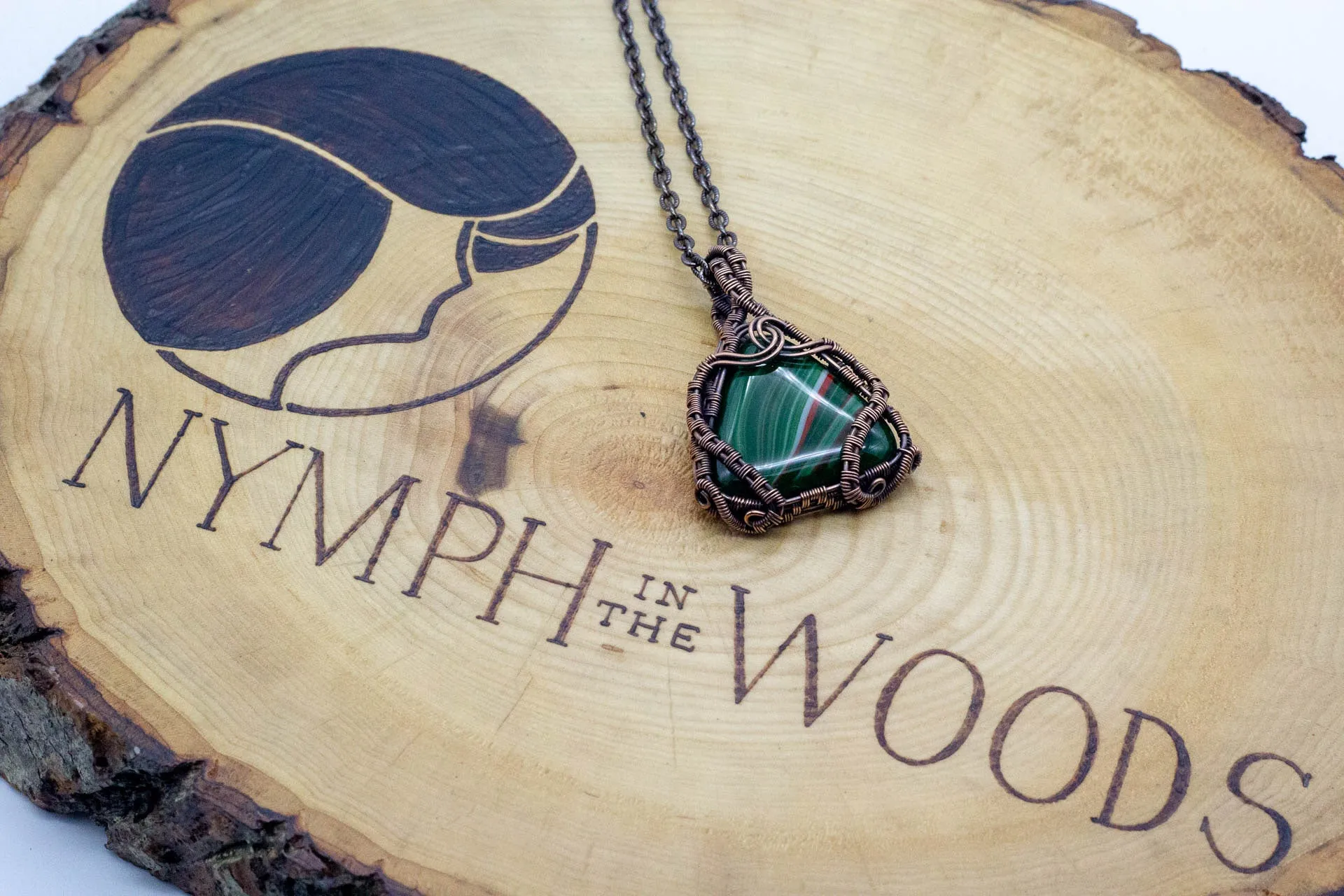 Streaked Green and Red Triangle Pendant with Copper Wire Wrapping