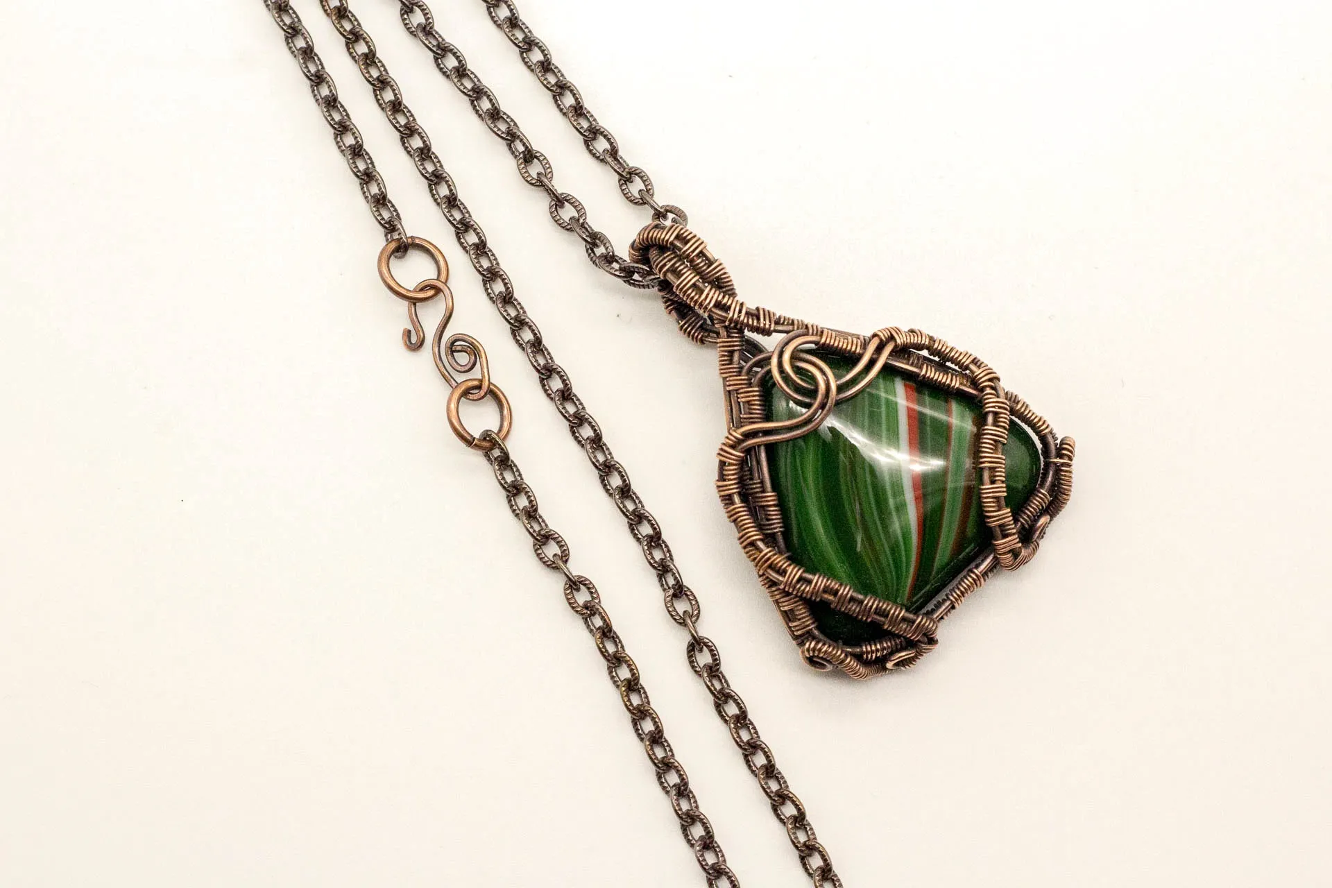 Streaked Green and Red Triangle Pendant with Copper Wire Wrapping
