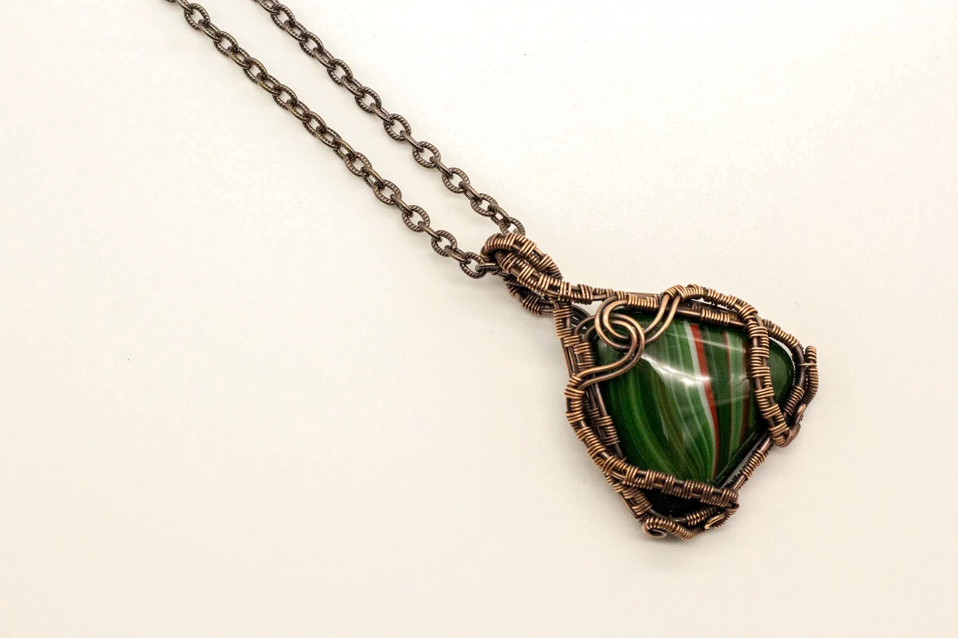 Streaked Green and Red Triangle Pendant with Copper Wire Wrapping