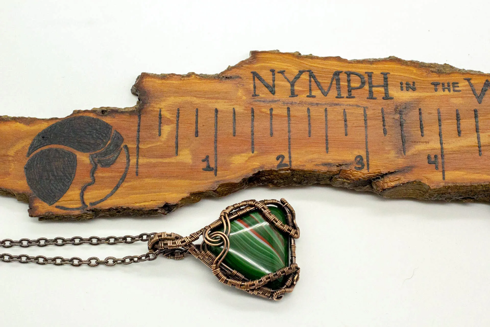Streaked Green and Red Triangle Pendant with Copper Wire Wrapping